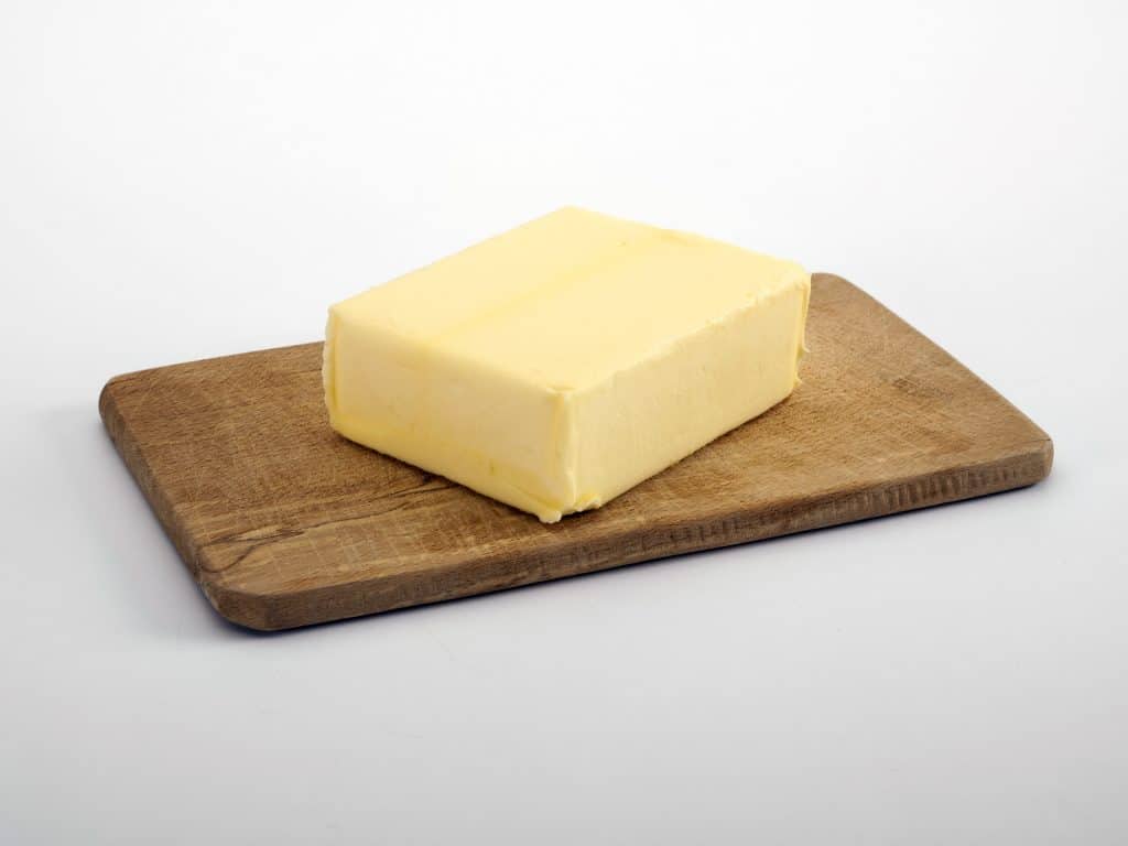 butter on a wooden tray